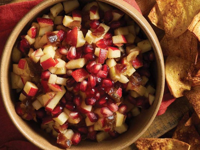 Apple Salsa with Cinnamon Tortilla Chips on a wood cutting board