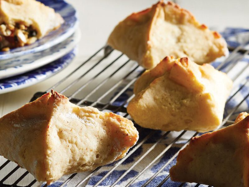 Creamy Vegan Spinach Knishes on a wire cooling rack