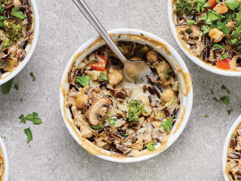 Individual Broccoli and Wild Rice Casseroles in white ramekins