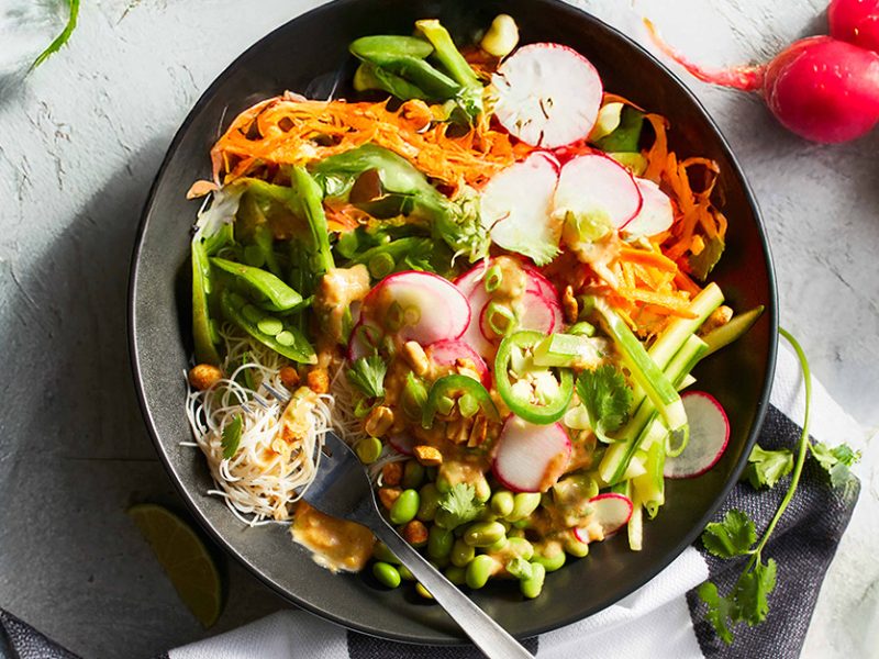 Spring Roll Bowl with whole radishes to the side