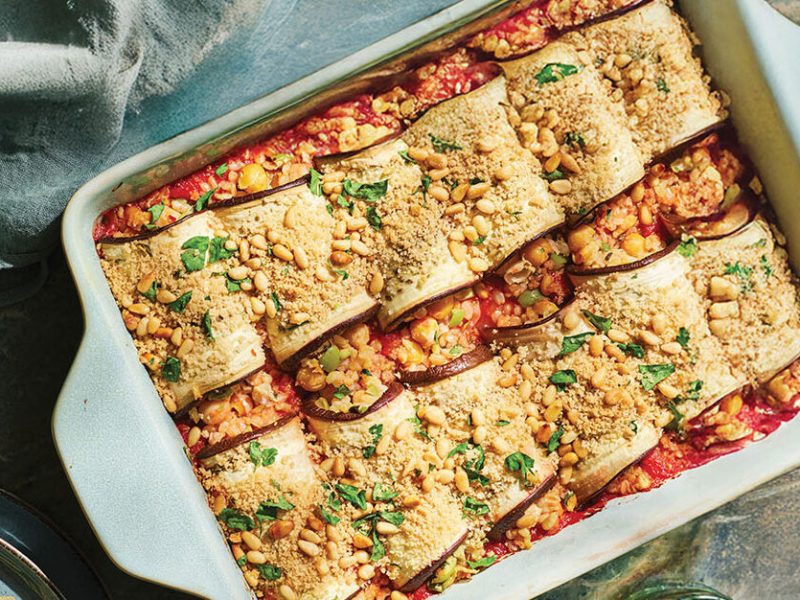 Risotto-Filled Eggplant Rollatini in a white casserole dish