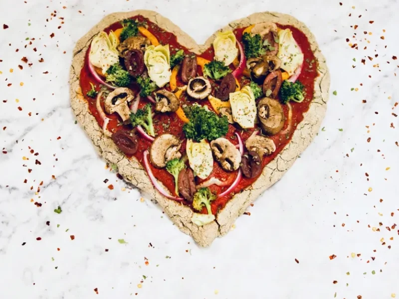 Heart-shaped gluten-free vegan pizza